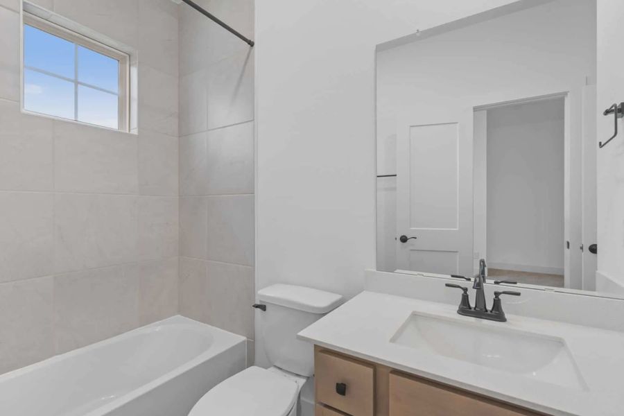 Image 34 representing the Chantilly 2 by Chesmar Homes in Meridiana Chateau, Manvel, TX.