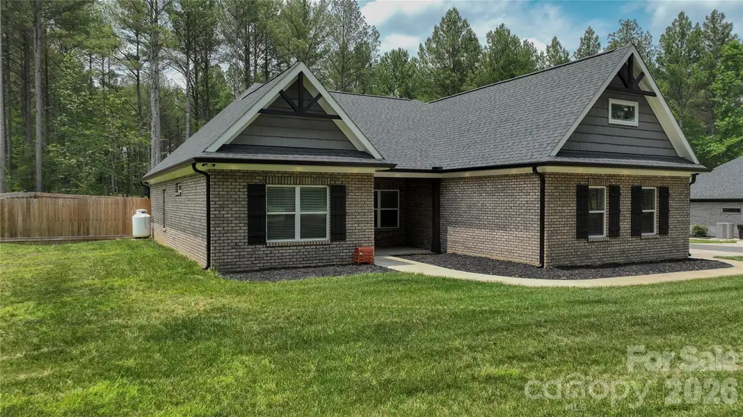 Exterior details and patio area of a home in , Marshville (Image 24).