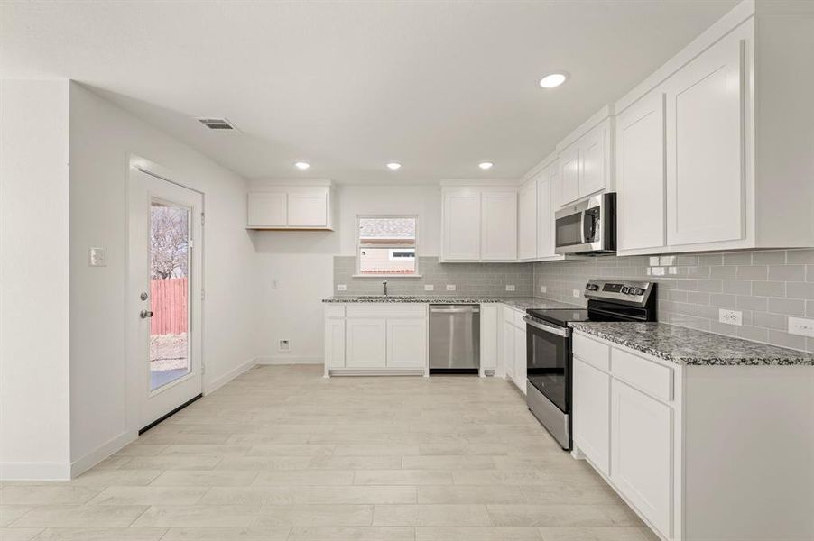 Furnished interior view inside a new home in Runaway Bay, Runaway Bay (Image 9).