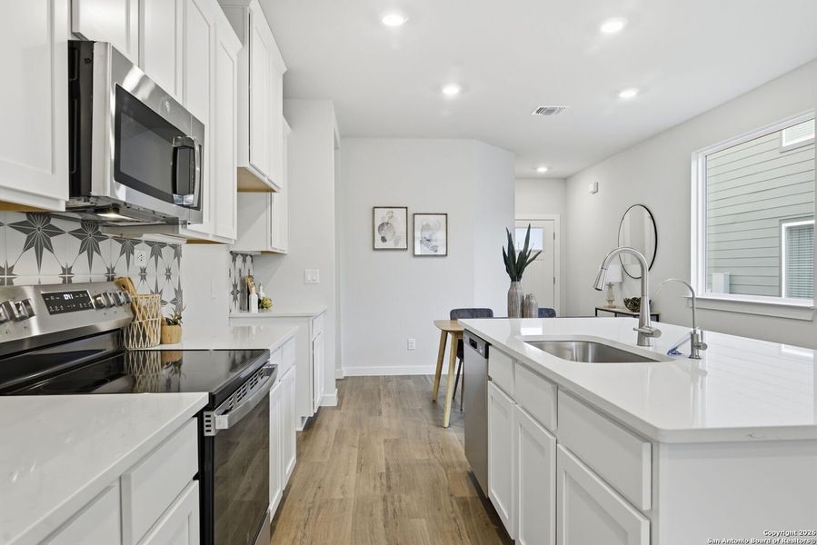 Furnished interior view inside a new home in Highland Ridge, New Braunfels (Image 14).