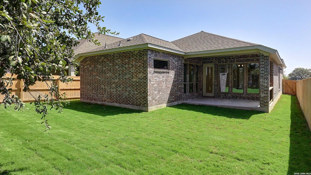 Exterior details and patio area of a home in Kallison Ranch, San Antonio (Image 25).