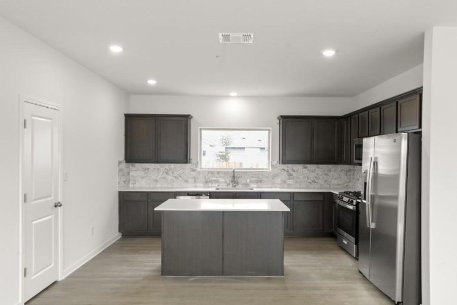 Furnished interior view inside a new home in Crosswinds, Kyle (Image 7).