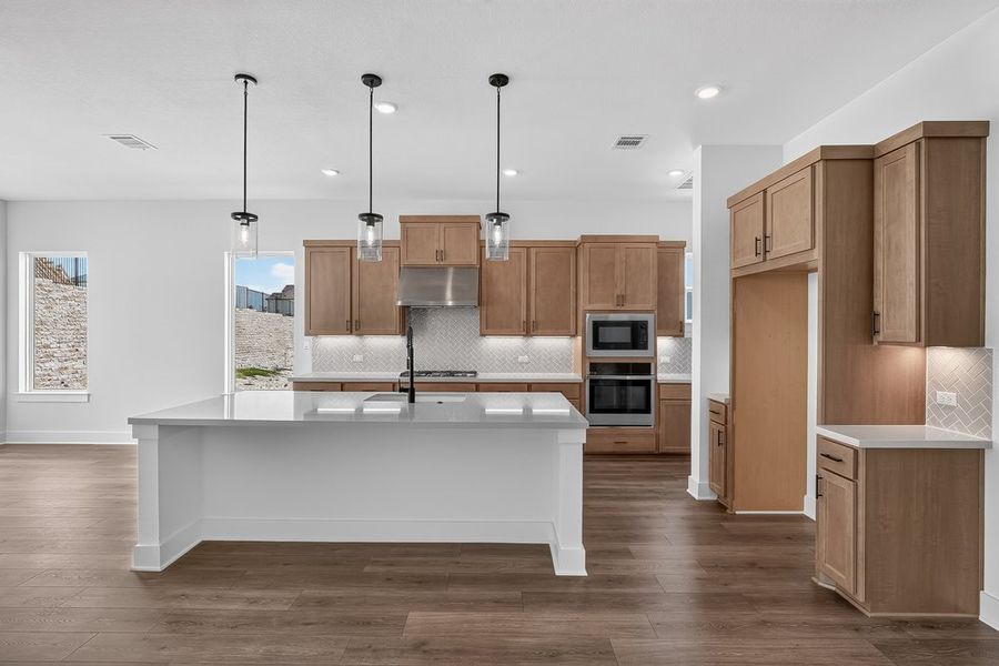 Furnished interior view inside a new home in Travisso, Leander (Image 29).