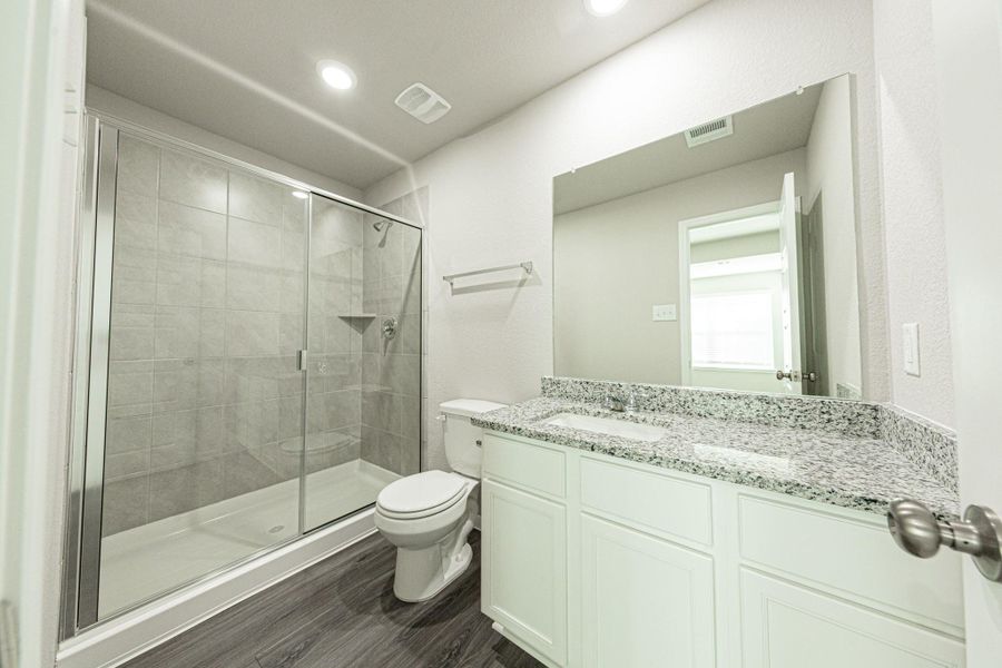 Furnished interior view inside a new home in Mackenzie Creek, Conroe (Image 5).