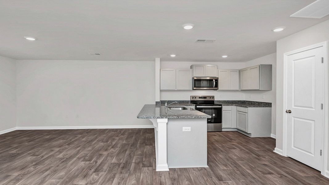 Furnished interior view inside a new home in Hunter's Branch Townhomes, Hopkins (Image 6).