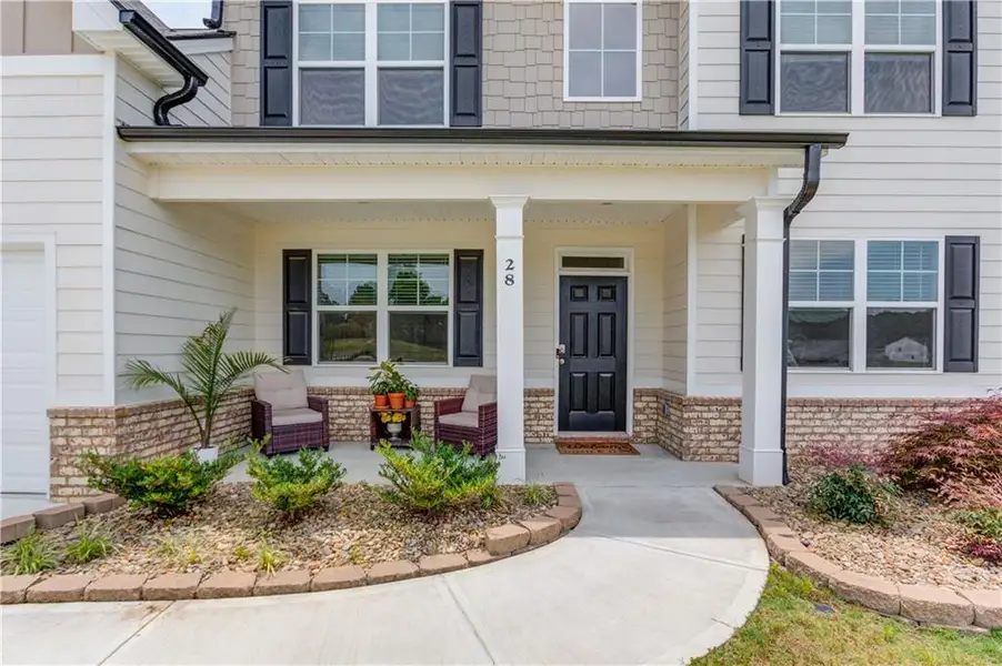Exterior details and patio area of a home in Stillwater Springs, Dacula (Image 3). Exterior details and patio area of a home in Stillwater Springs, Dacula (Image 3).
