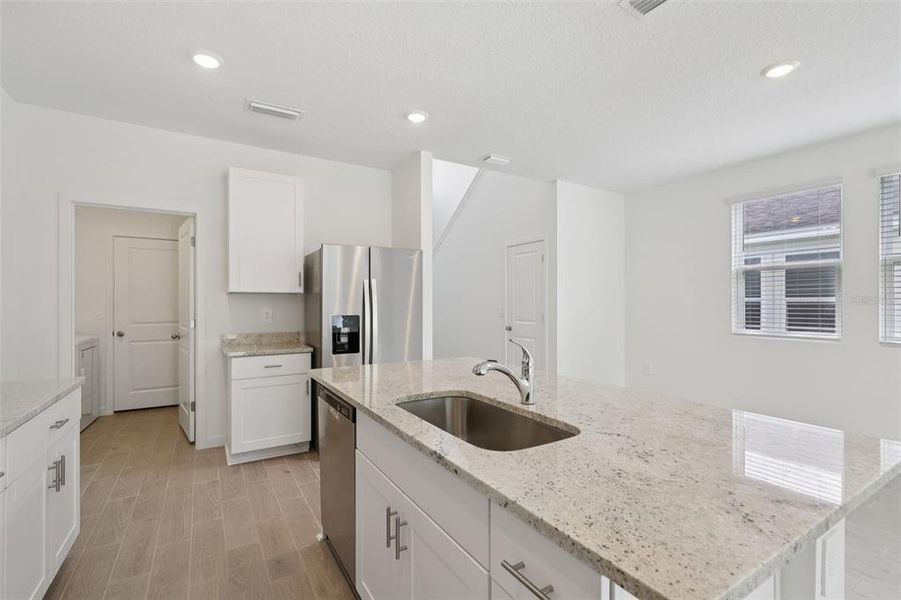 Furnished interior view inside a new home in Flagler Village - Classic Series, Palm Coast (Image 4).