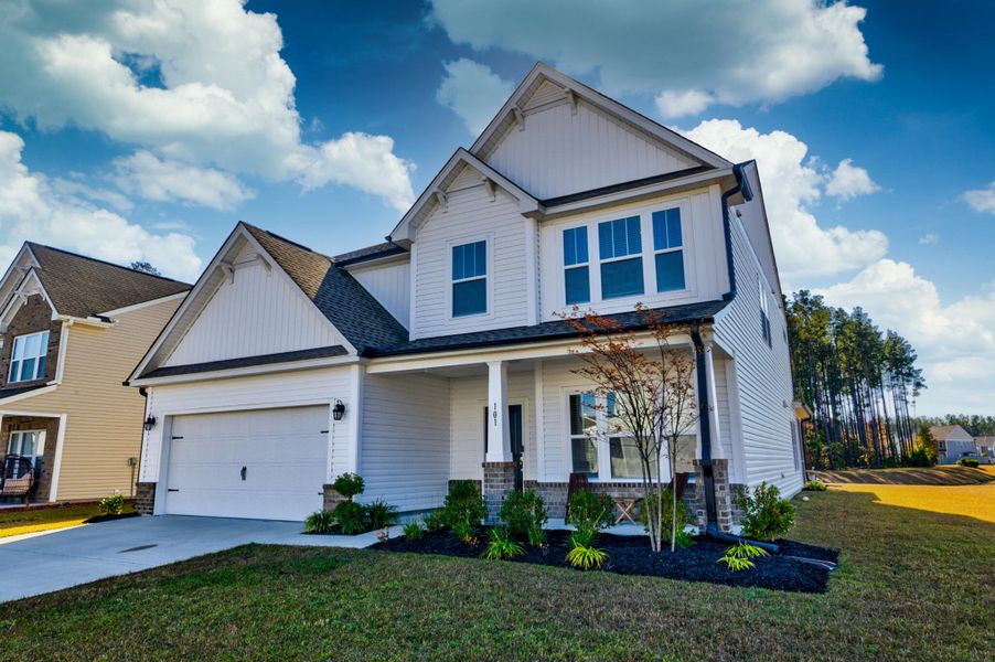 Front exterior of a new home in , Summerville, SC, highlighting curb appeal (Image 25).