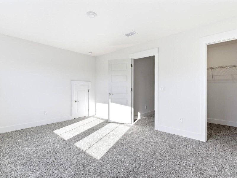 Spacious, unfurnished interior of a new home in The Coves at Lakes of Cane Bay, Summerville (Image 26). Spacious, unfurnished interior of a new home in The Coves at Lakes of Cane Bay, Summerville (Image 26).