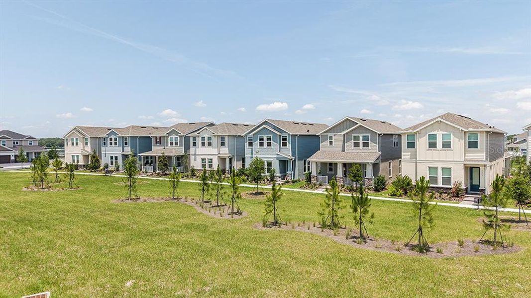 Front exterior of a new home in Center Lake Ranch Community Group Page, St. Cloud, FL, highlighting curb appeal (Image 27).