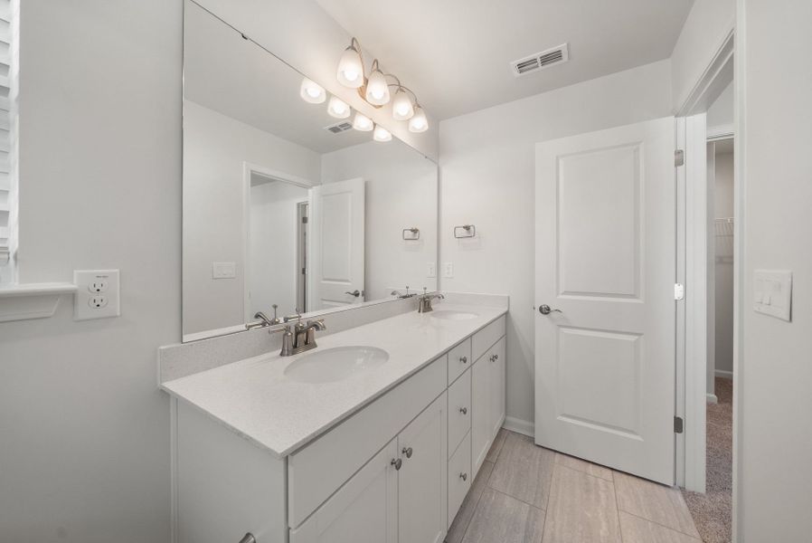 Furnished interior view inside a new home in Huxley, Apex (Image 7).