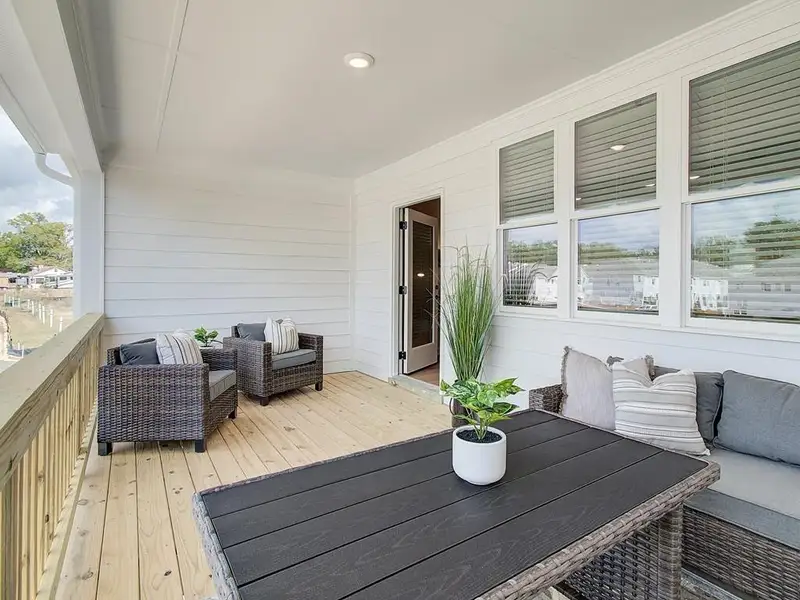 Exterior details and patio area of a home in Townes at South Main, Kennesaw (Image 4).