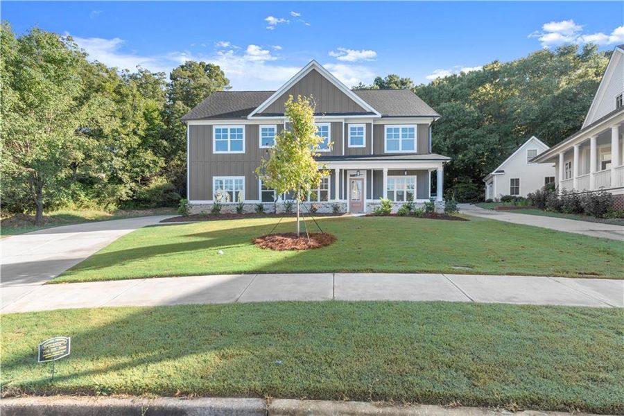 Front exterior of a new home in , Covington, GA, highlighting curb appeal (Image 22).