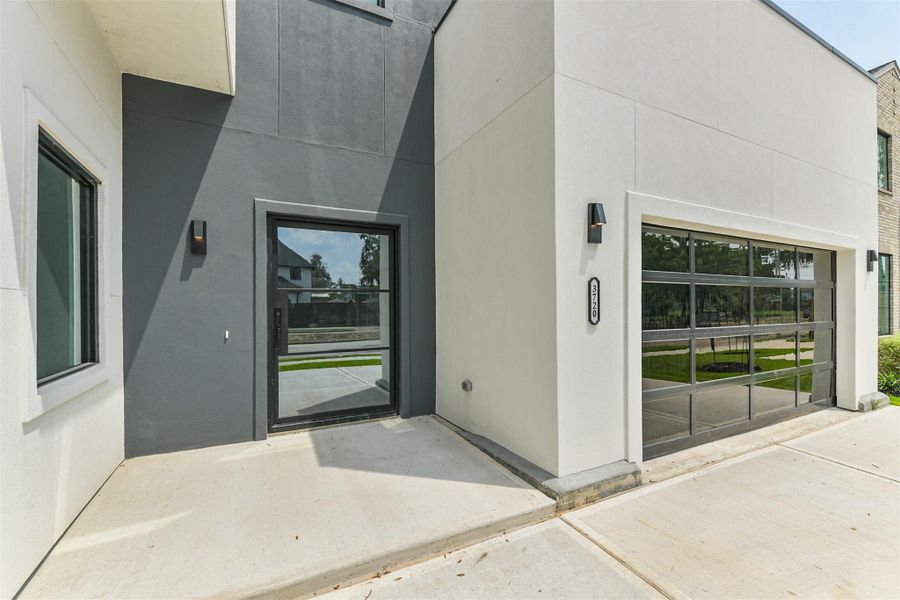 Front exterior of a new home in , Houston, TX, highlighting curb appeal (Image 24).
