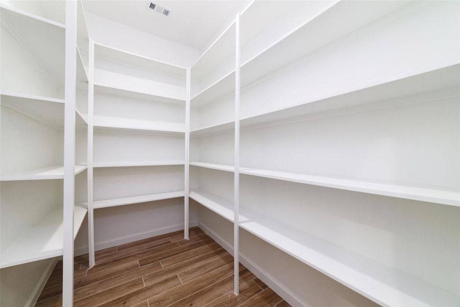 Large walk-in pantry just off the kitchen. Large walk-in pantry just off the kitchen.