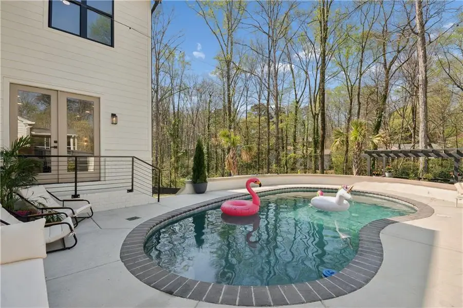 Exterior details and patio area of a home in , Atlanta (Image 24).