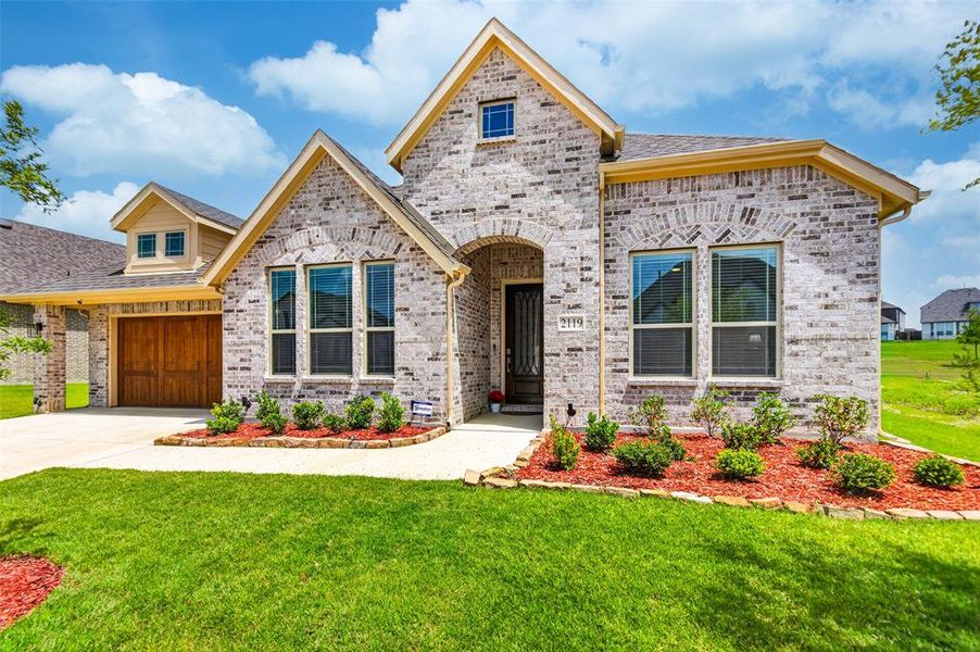 Front exterior of a new home in , Forney, TX, highlighting curb appeal (Image 2). Front exterior of a new home in , Forney, TX, highlighting curb appeal (Image 2).