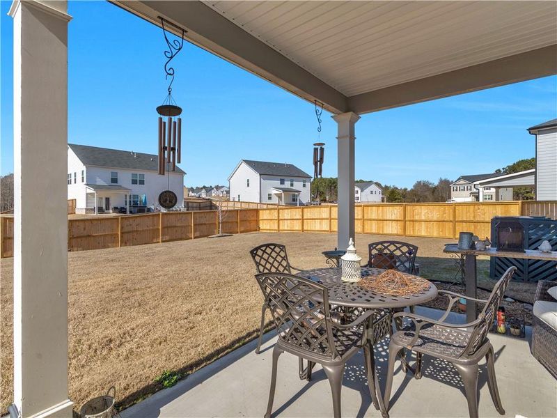 Exterior details and patio area of a home in Bridle Creek, Locust Grove (Image 3).