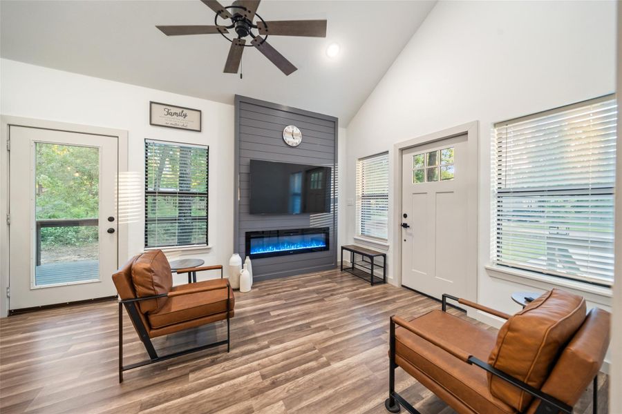 Relaxing living area with massive ceilings!