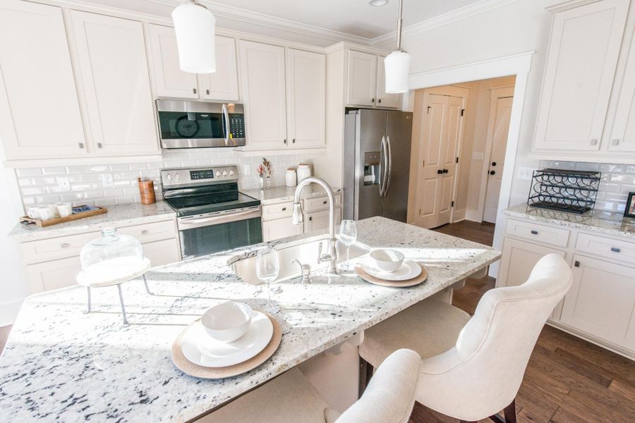 Representative furnished interior of a home built from the Kauai by Bill Clark Homes in Osprey Landing, Southport (Image 12). Representative furnished interior of a home built from the Kauai by Bill Clark Homes in Osprey Landing, Southport (Image 12).