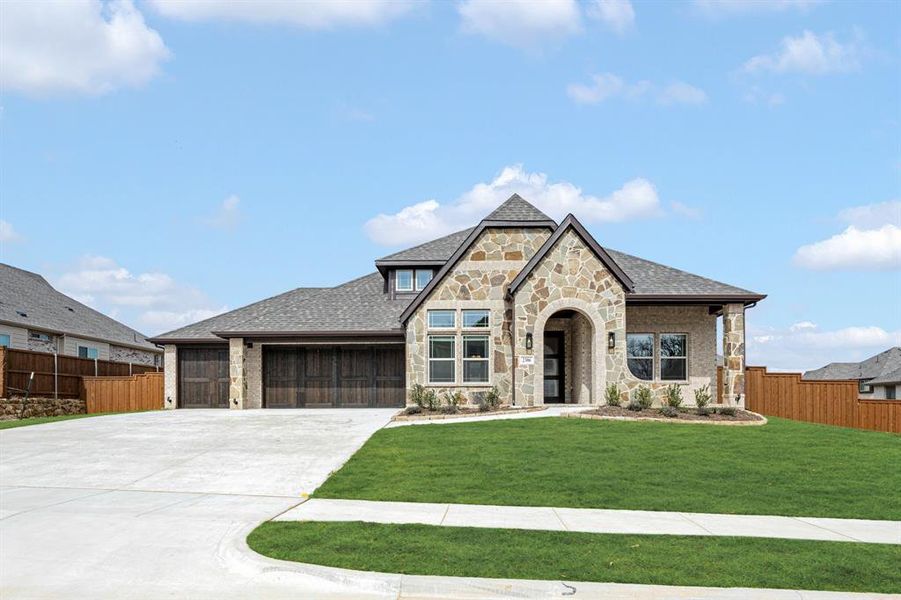Front exterior of a new home in Rockwood, Mansfield, TX, highlighting curb appeal (Image 2).