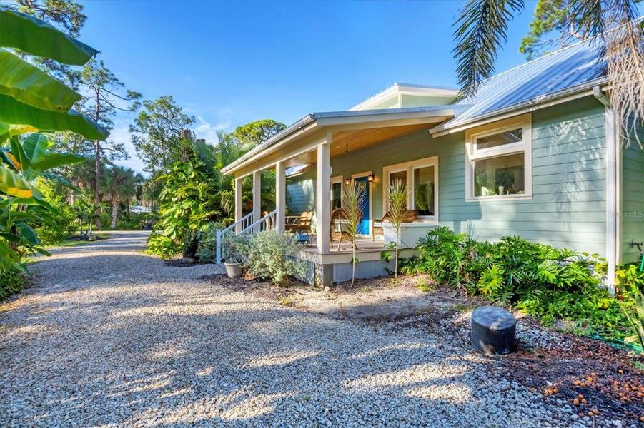 Front exterior of a new home in , Englewood, FL, highlighting curb appeal (Image 23).