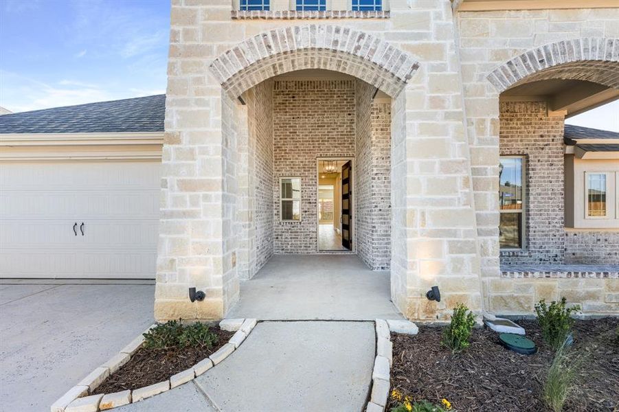 Exterior details and patio area of a home in Mockingbird Hills 60-65, Joshua (Image 4).