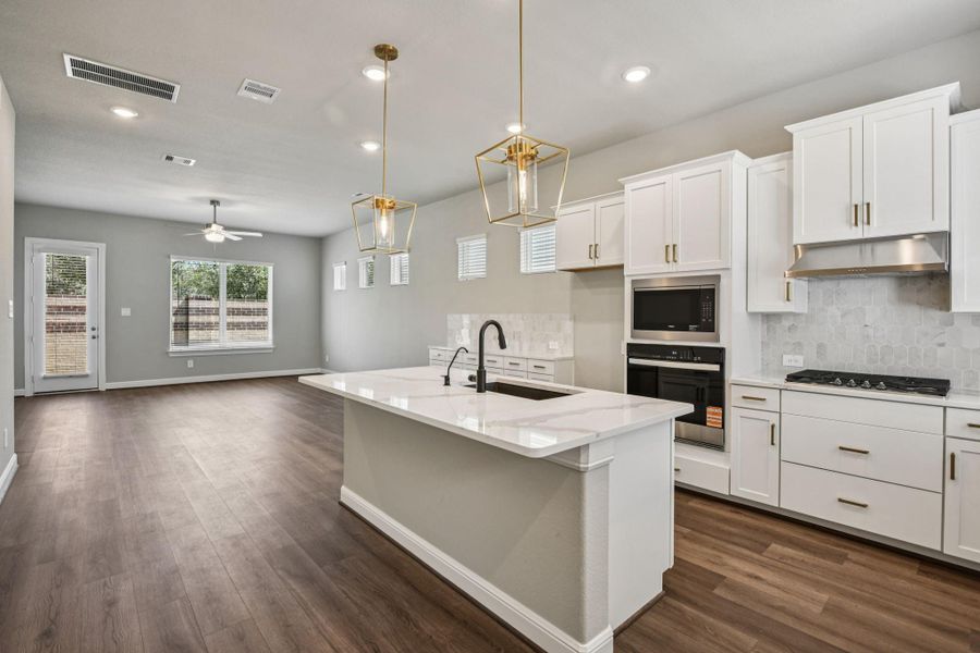 Furnished interior view inside a new home in Spring Brook Village - Luxe Series, Houston (Image 8).