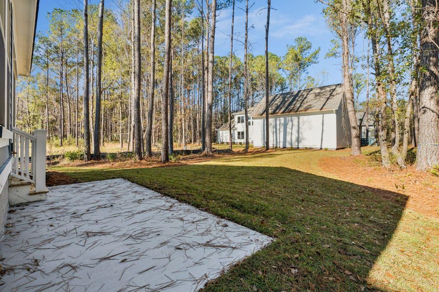 Exterior details and patio area of a home in , Awendaw (Image 34).