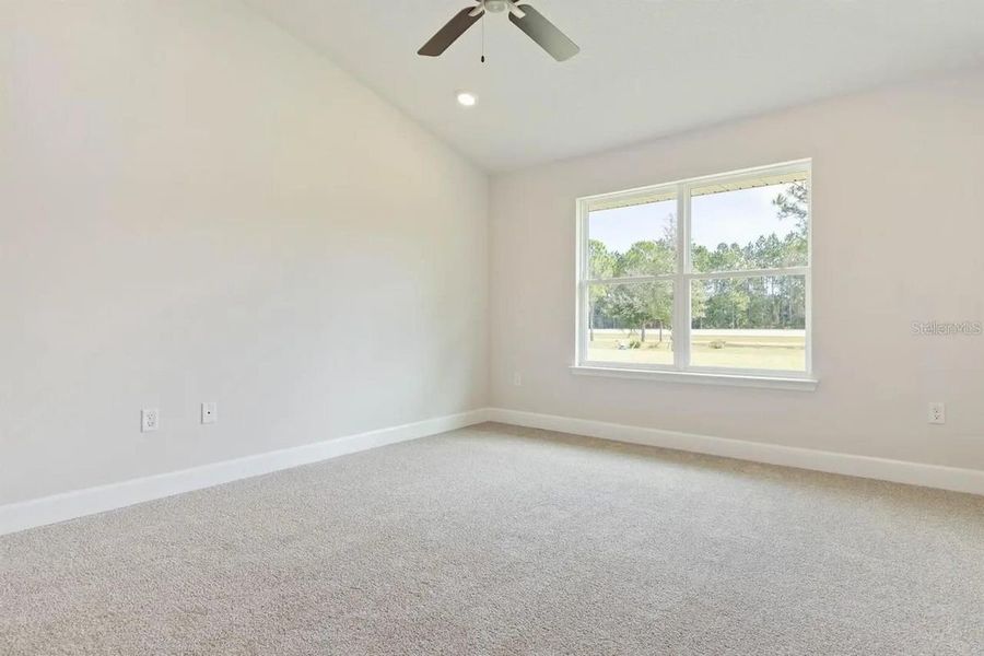 Representative unfurnished interior of a home built from the 1512 by Adams Homes in Winding Oaks, Weeki Wachee (Image 13).