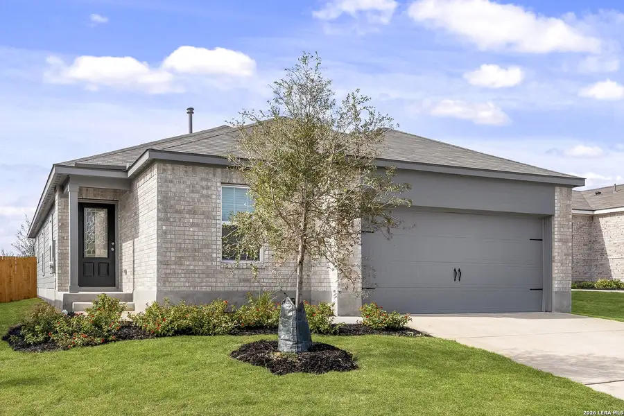 Front exterior of a new home in Preserve at Medina, Von Ormy, TX, highlighting curb appeal (Image 1). Front exterior of a new home in Preserve at Medina, Von Ormy, TX, highlighting curb appeal (Image 1).