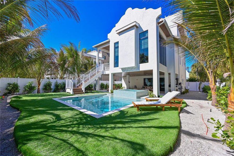 Exterior details and patio area of a home in , Anna Maria (Image 26).