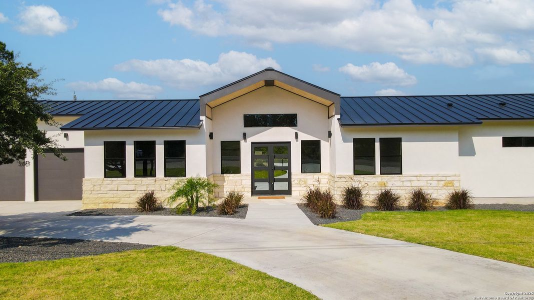 Front exterior of a new home in , San Antonio, TX, highlighting curb appeal (Image 23). Front exterior of a new home in , San Antonio, TX, highlighting curb appeal (Image 23).