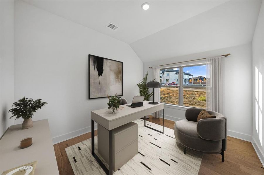 Home office featuring lofted ceiling, light wood-type flooring, and recessed lighting Home office featuring lofted ceiling, light wood-type flooring, and recessed lighting