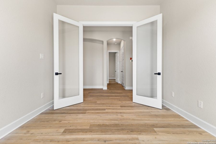 Spacious, unfurnished interior of a new home in The Enclave at Potranco Oaks, Castroville (Image 36).