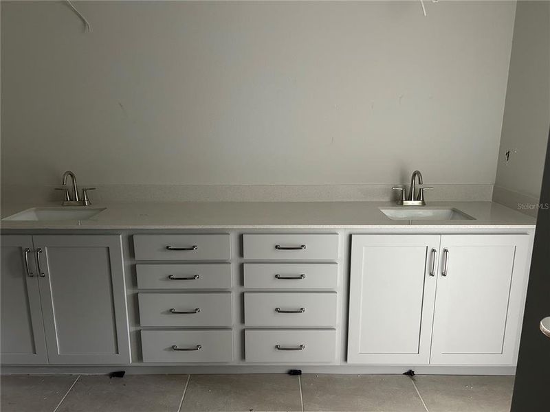 In-progress construction of a new home in Oakfield Trails Signature, Parrish, FL (Image 27).