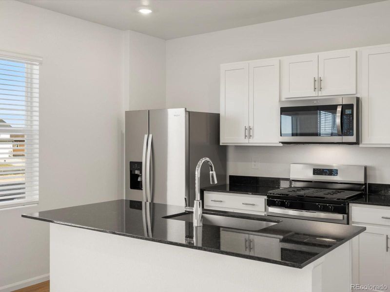 Furnished interior view inside a new home in Westgate, Greeley (Image 7).
