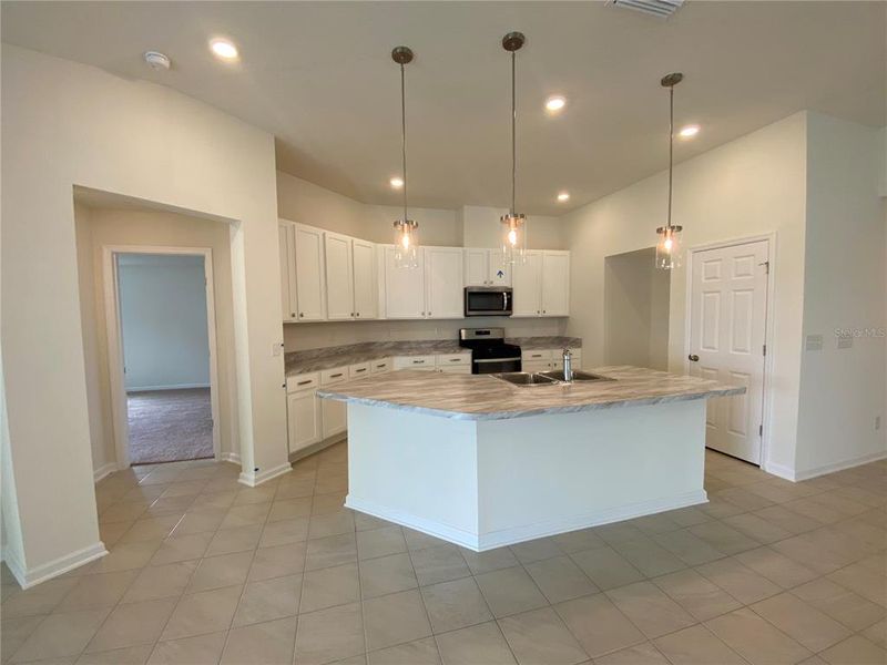 Furnished interior view inside a new home in Somerset - Executive Series, Palm Coast (Image 4).