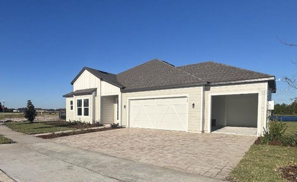 Exterior details and patio area of a home in Ardisia Park Estate, New Smyrna Beach (Image 24).