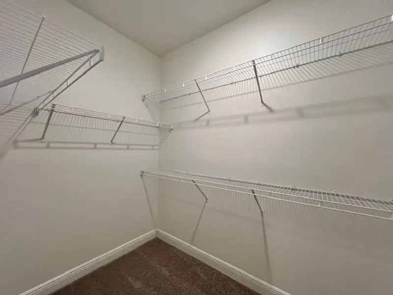 Spacious, unfurnished interior of a new home in Lakes At St Sebastian, Micco (Image 22).