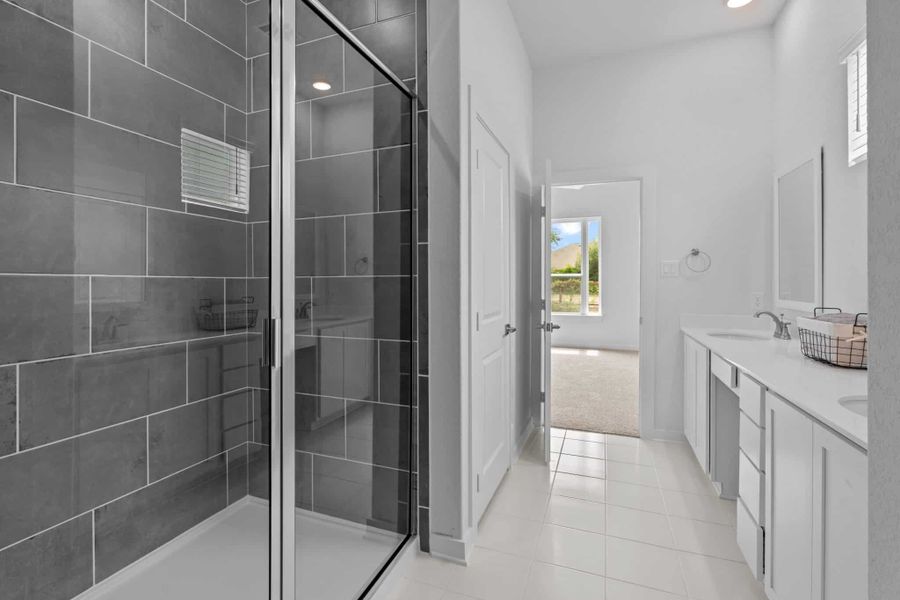 Representative furnished interior of a home built from the Ryker by Chesmar Homes in The Crossvine – Garden Homes, Schertz (Image 6).