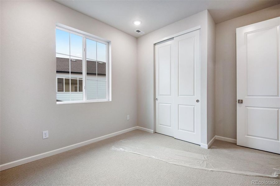 Spacious, unfurnished interior of a new home in Painted Prairie, Aurora (Image 37).