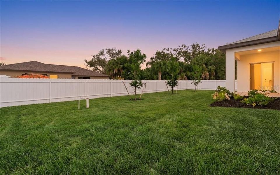 Exterior details and patio area of a home in , North Port (Image 33).