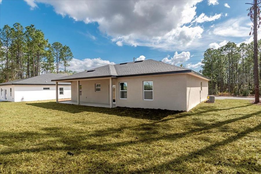 Exterior details and patio area of a home in , Citrus Springs (Image 34).