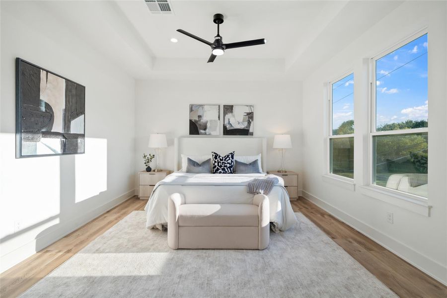 The primary suite offers impressive depth and space, giving it a grand and luxurious feel. Its expansive layout creates a serene retreat where comfort and style come together effortlessly. Every detail enhances the sense of openness and elegance in this private sanctuary.