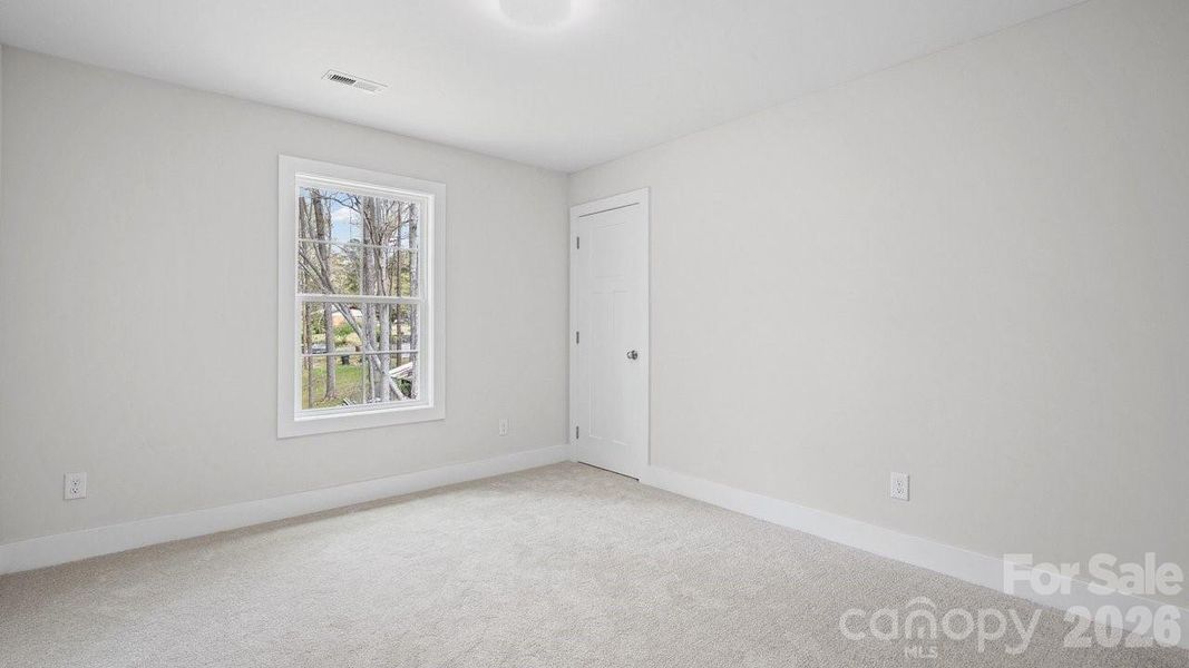 BR with walk-in closet.