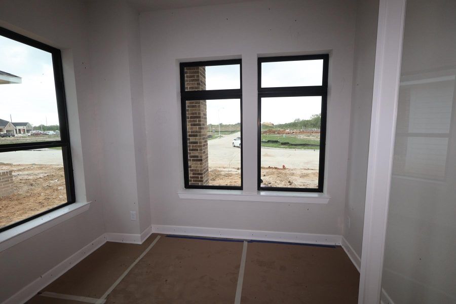 In-progress construction of a new home in Sienna - Landmark Row Collection, Missouri City, TX (Image 10).