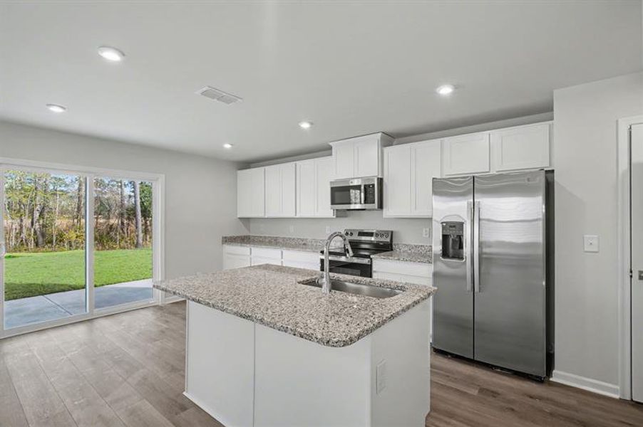 Furnished interior view inside a new home in Sterling Oaks, Ash (Image 4). Furnished interior view inside a new home in Sterling Oaks, Ash (Image 4).