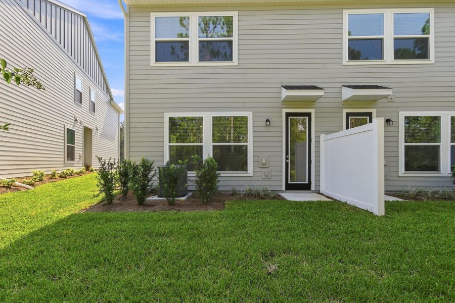 Exterior details and patio area of a home in Preserve at The Cays – The Harbor Series, Daytona Beach (Image 4).