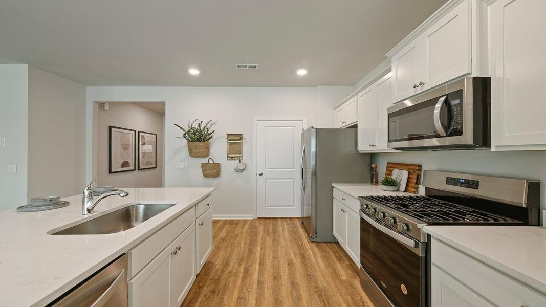 Furnished interior view inside a new home in The Ranch, Holly Hill (Image 8).